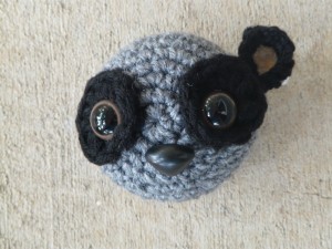The head of the lemur-to-be complete save for one ear