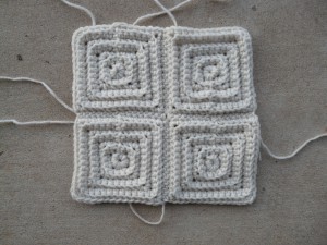 Four of the foundation motifs joined into a square