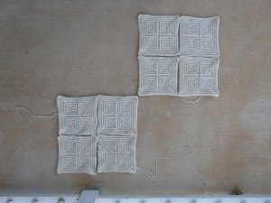 The eight medium squares arranged into two two-by-two arrays