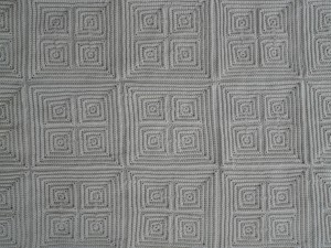 A detail of the front of the completed textured squares afghan