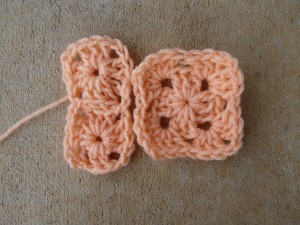 Two 1 x 1 granny squares and one 2 x 2 granny square