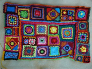 The granny square sampler afghan so far